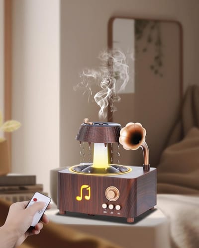 Roterende luchtbevochtiger in de vorm van een regendruppel, aromadiffuser in retro vinylplatenspelerstijl met witte ruis en sfeerverlichting in 7 kleuren.