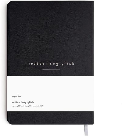 Daily Goal Setter Planner 6 maanden - Zwart 274 Pagina's - Ongedateerd - Productiviteitsdagboek - Affirmaties - notitiepagina's - wekelijkse & maandelijkse weergave - Mindfulness & Wellbeing Manifestation Planner