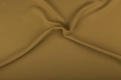 Texture/Polyester stof - Camel bruin - 25 meter