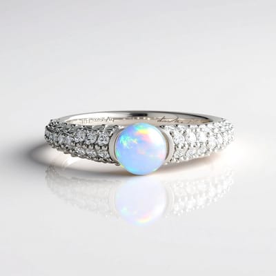 Cavill - Welo Opaal Ring 0.74 ct - 925 Sterling Zilver Platina - Ronde Ethiopische Opaal - 28 Cambodjaanse Zirkonia's - Luxe Dames Ring Elegant