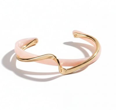 Roze goudkleurige bangle armband voor dames – metalen armband met golvend design