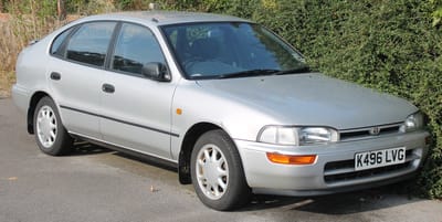 Toyota Corolla type E100 hatch/liftback model 1992-1997 donkere zijwindschermen pasvorm merk Team Heko set a 4 stuks tbv V&A deuren