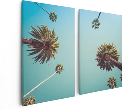 Artaza Canvas Schilderij Tweeluik Palmbomen met Bladeren in de Lucht - 80x60 - Foto Op Canvas - Canvas Print