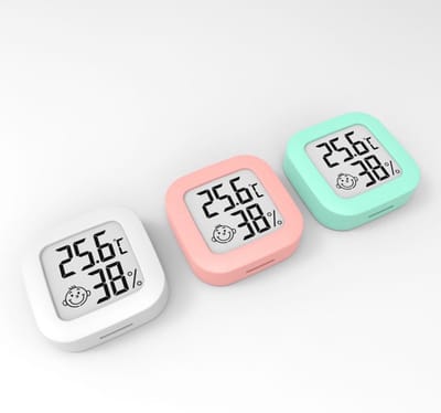 Digitale Weerstation - Thermometer & Hygrometer - Luchtvochtigheidsmeter - Met Comfort Smiley Indicator - Groot LCD Display - Inclusief Batterij - Voor Babykamer - Wit