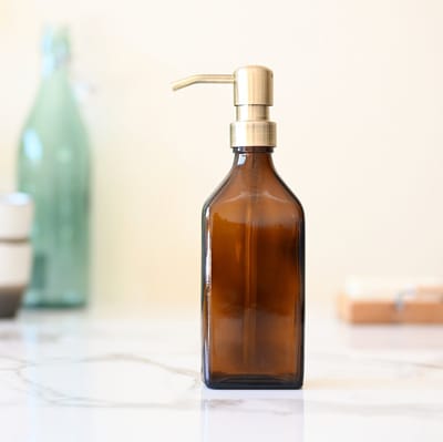 Groeikruid® zeeppompje vrijstaand | 250 ml rechthoekig amber glas | RVS pompkop | Zeepdispenser bronsgoud
