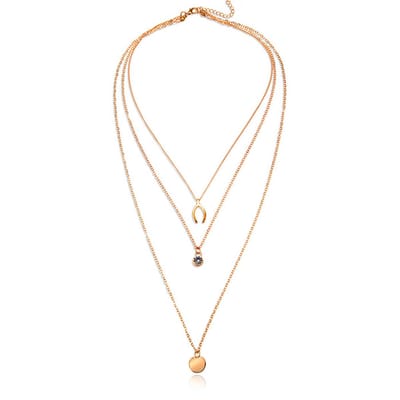 Gelaagde goudkleurige ketting Wishing Bone muntje en Zirkonia