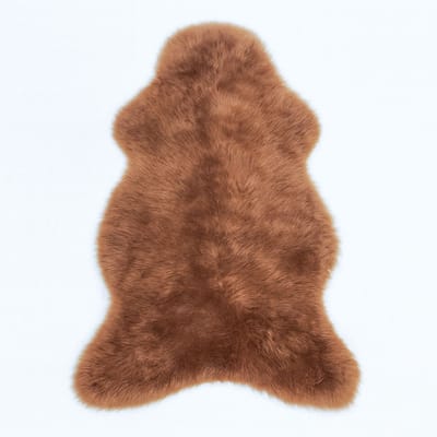 Texels schapenvacht XL karamel – echt & natuurlijk – stoel, bank of vloerkleed Mooie Skéépe vacht