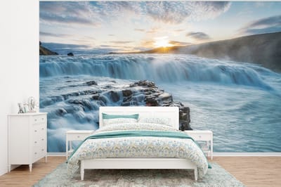 Behang - Fotobehang Waterval - Water - Stenen - Zon - Natuur - Breedte 350 cm x hoogte 260 cm