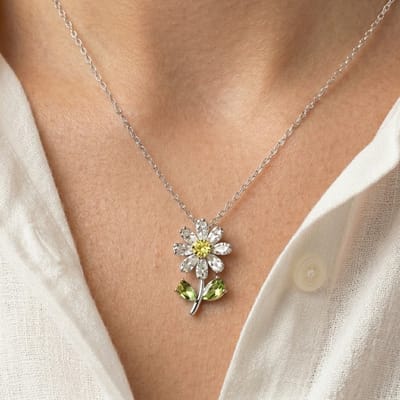 Zilverkleurige ketting voor dames met bloemen hanger en kristal details