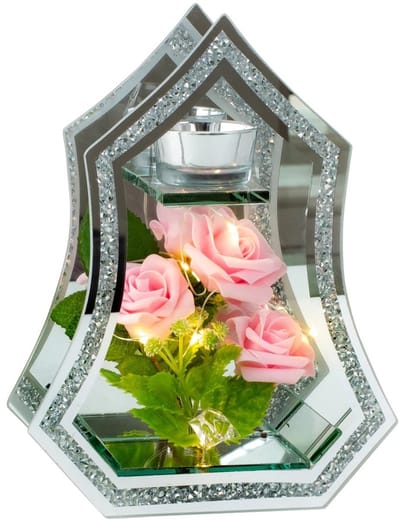 Glazen decoratie met rozen en theelichtje