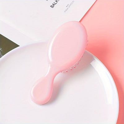 1 brosse démêlante rose en plastique, peigne à coussin d'air pour tous les types de cheveux, doux, facile à utiliser, accessoires de voyage rose