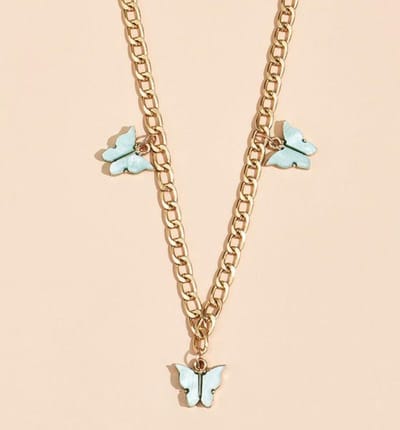 Blauwe vlinders ketting | goud gekleurd