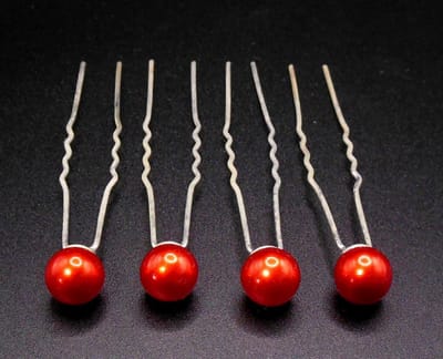 Haarpinnen parel rood per 4 stuks.