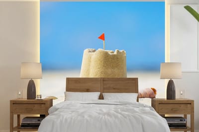 Behang - Fotobehang Zandkasteel - Strand - Schelpen - Zomer - Breedte 220 cm x hoogte 220 cm