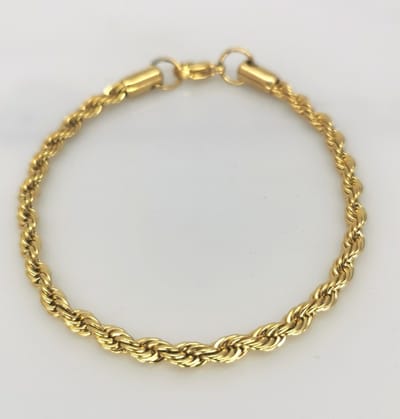 Schitterend - RVS - Goudkleur- armband -maat 20 - gedraaide en gevlochten effect voor zowel dames en heren.