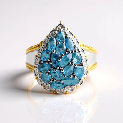 Cavill - Luxe Zilveren Ring - 925 Sterling Zilver met Goudaccenten - Tanzaniaanse Aquamarijn 1,863 ct - Druppelvorm - Elegante Ring met Blauwe Stenen