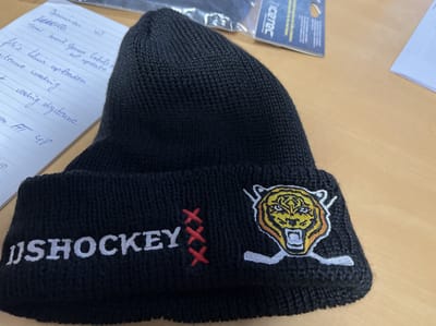 IJshockey muts Amstel Tijgers Retro zwart geborduurd OSFA
