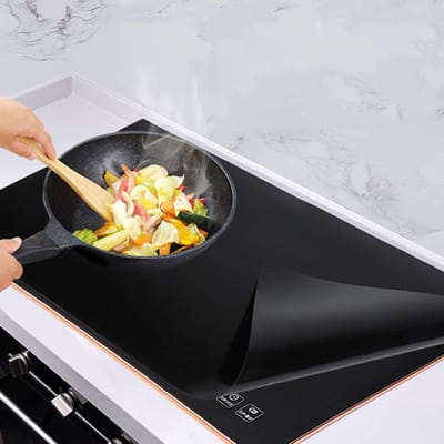 Grote siliconen beschermmat voor inductiekookplaat 52 x 78 cm, hittebestendig en isolerend, ideaal voor keukenbescherming en onderhoud