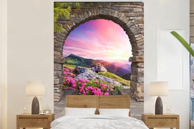 Behang - Fotobehang Landschap - Doorkijk - Bloemen - Berg - Breedte 195 cm x hoogte 300 cm