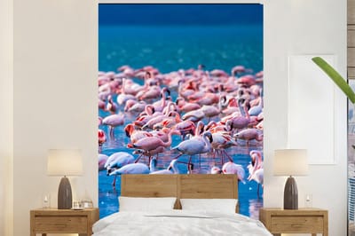 Behang - Fotobehang Flamingo - Water - Tropisch - Water - Roze - Breedte 145 cm x hoogte 220 cm