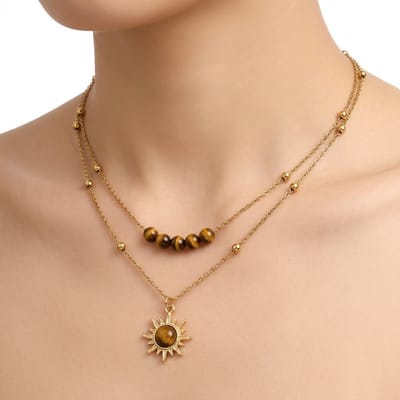 Goudkleurige ketting dames layer ketting met zon hanger kralen ketting dubbellaagse vintage hals ketting minimalistische sieraden met bruine kralen en zon motief