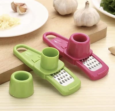 Roze Knoflookpers - Gemberpers - Rasp voor knoflook, gember en meer - Knoflookschaaf - Gemberschaaf - Knoflook Snijder - Gember Snijder - Kleine schaafmachine - Roze