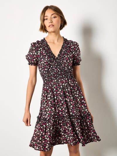 Mini-jurk met smockwerk en kleine bloemenprint