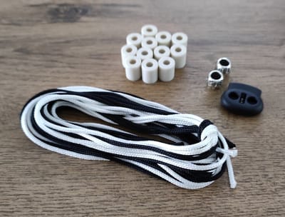 DIY Pakket / Doe Het Zelf / Anti-Tekenband EM kralen Zwart/Wit maat 25-30