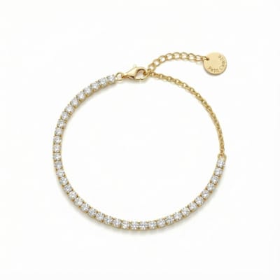 Petit Comité - Armband Dames Goudkleurig Tennis Bracelet - Geboortesteen April Kristal Diamand - 925 Sterling Zilver - 18k Gold Plated