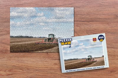 Puzzel De boer met een ploeg achter zijn tractor - Legpuzzel - Puzzel 500 stukjes