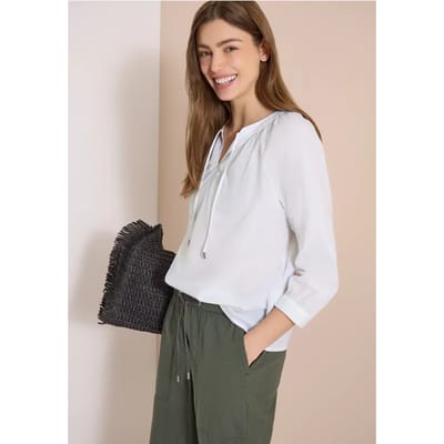 Blouse met 3/4 mouwen en gespleten hals in effen kleur