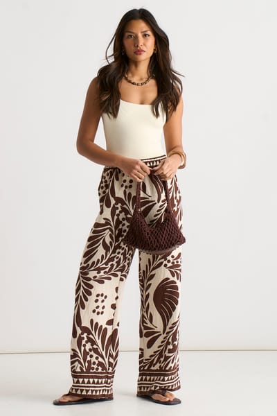 Chocoladebruine broek met elastische tailleband en randprint
