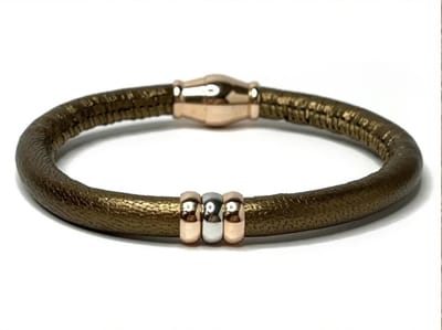 NIEUW! Jolla - dames armband zilver - metallic leer - magneetsluiting - bedels - tweekleurig - Single Ladies Metallic - Bronze