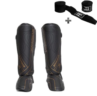 Joya ESSENTIAL Scheenbeschermers – Kickboksen/Muay Thai/MMA – Zwart/Goud – Maat XL – Ergonomische pasvorm, schokabsorberende padding – Inclusief Bandage