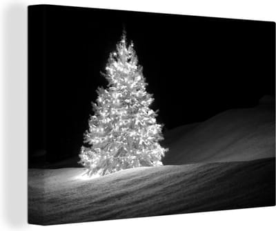 Canvas Schilderij Een verlichtte kerstboom tijdens de nacht - zwart wit - 30x20 cm - Wanddecoratie