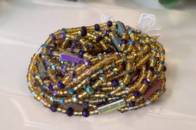 AfricanFabs® Waist Beads / Afrikaanse Heupketting - Adamma - Goud mix (Traditioneel niet-elastisch koord) - Buikketting - Taille ketting