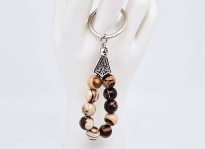 Handgemaakte druppel sleutelhanger van natuursteen " Australia Zebra Jasper" en metaal - diameter kralen 10mm - Aantal stenen10- Een mooi cadeau-idee en een bijzonder aandenken