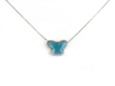 korte zilveren halsketting halssnoer collier gerhodineerd Model Vlinder met turkoois blauwe steen