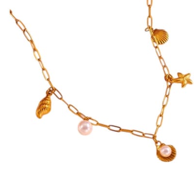 Aramat Jewels | Halskettingen | Goudkleurige damesketting met schelp- en parelbedels | | | |1,5mm | Staal | Volwassenen | Verkleurd niet