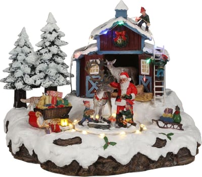 Luville Kerstdorp Miniatuur Santa's Dorp met Kerstman, Elfjes en Rendier - Kerstversiering met Roterend Plateau en Verlichting - Kerst Deco Tafereel met Adapter - L23,5 x B21 x H20 cm - Meerkleurig