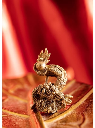 Miniatuur dansende draak messing