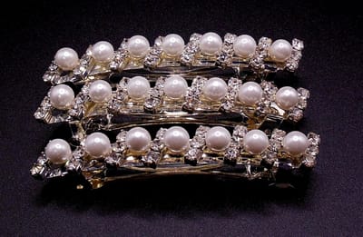 Patentspeld met 7 parels en strass set van 3 stuks.