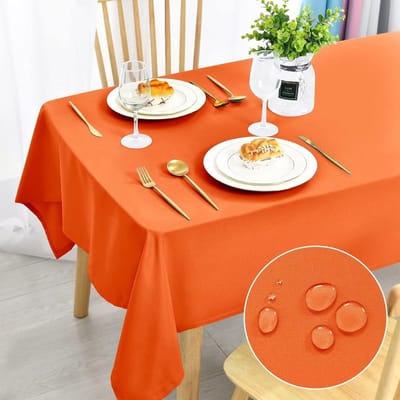 Famanu - Oranje tafelkleed, vlekbescherming, afwasbaar, tafellinnen, waterdicht, voor eetkamer, tuin, feest, bruiloft of huishouden, 140 x 240 cm