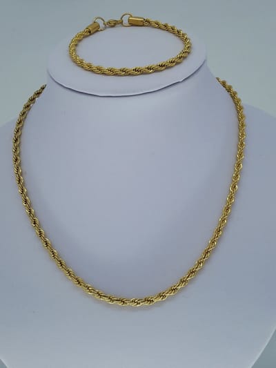 Set prachtige - Twisted - rvs - goudkleurig collier L 45 cm D 4mm met armband 20 cm. Chique voor alle gelegenheid.