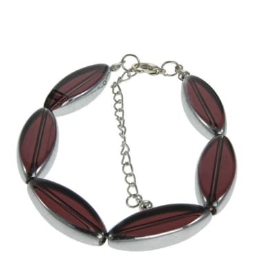Behave - armband met ovaal rode stenen - elegant bij avondkleding