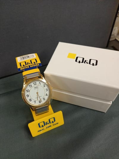 Q&Q Horloge unisex- zilverkleurig/goudkleurig met rekband.