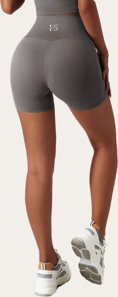June Spring Sportlegging - Maat: S - Kleur: Clay (Grijs / Donkergrijs) - Korte Broek / Shorts - Korte Legging - Korte Sportlegging - Short Legging - Dames Sportlegging - Fitness Outfit - Sportkleding - Legging met Zakken - Telefoonzak Legging