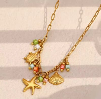 Boho kleurrijke ketting in gouden tinten - leuke hangers - roestvrij staal
