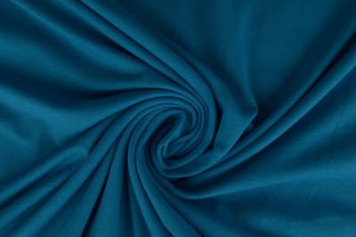 Katoen tricot stof - Petrol - 10 meter