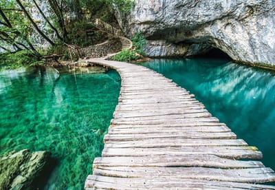 Fotobehang Wooden Bridge in Lagoon | XL - 208cm x 146cm | 130g/m2 Vlies